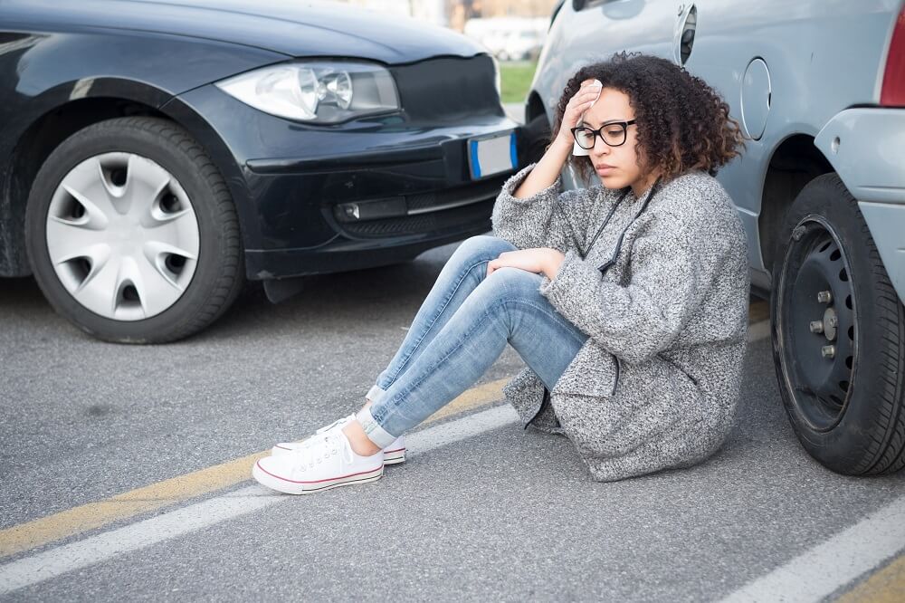 Woman has head injuries from car accident.