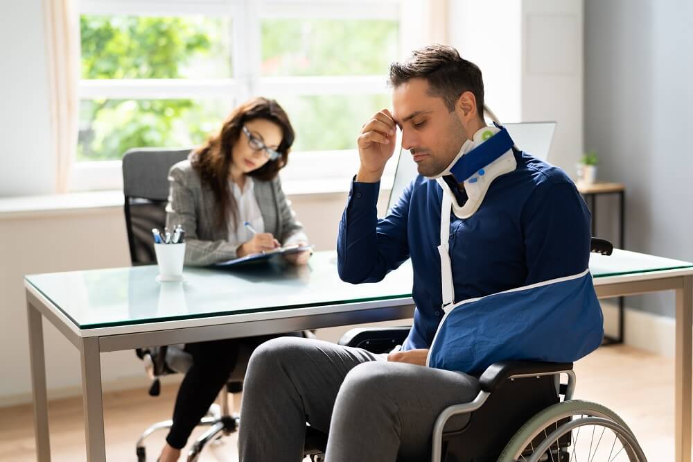 Disabled worker reporting to file for claims.