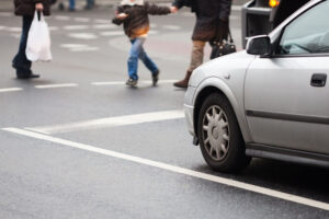 Pedestrian crossing the street.