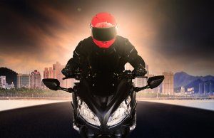 motorcycle rider with helmet
