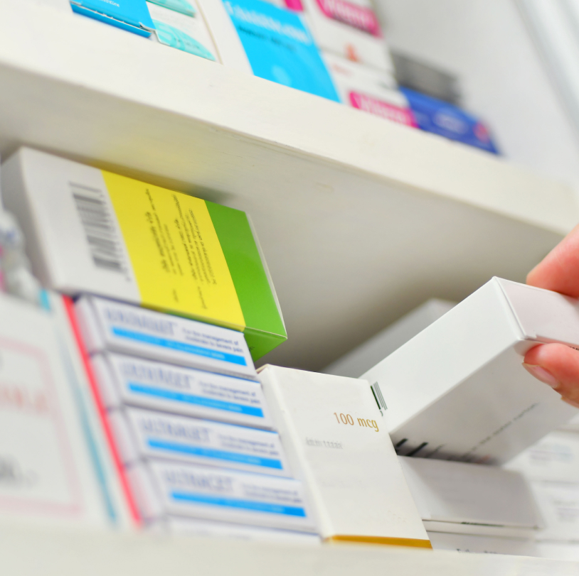 medicines on shelves in pharmacy