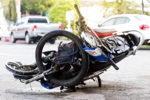 Close-up of a motorcycle, crushed by a severe accident.