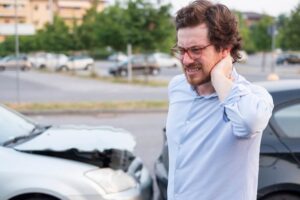 Driver suffering neck injury from a rear end car accident.