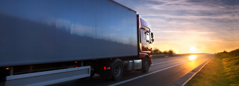 semi truck driving on the road