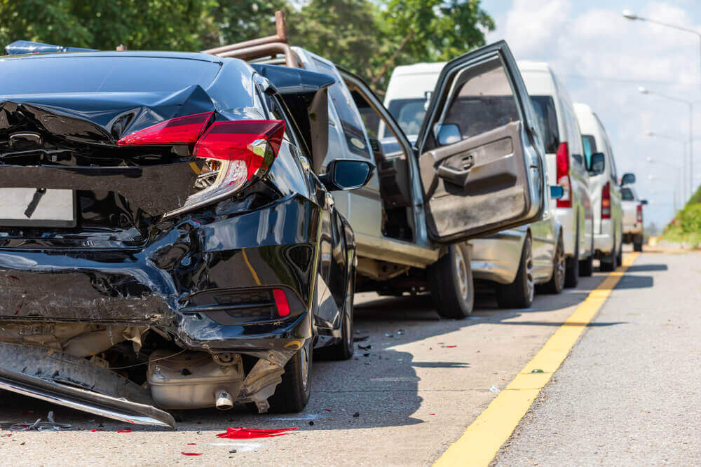 Multiple vehicle collision on a highway.