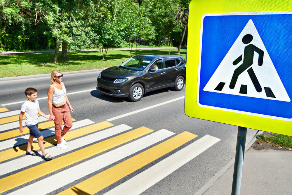 Pedestrians crossing the street.